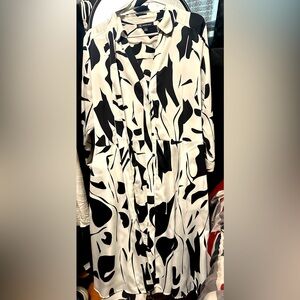 white & black 3/4 sleeve dress. Can be worn to church, work, or 4 date night